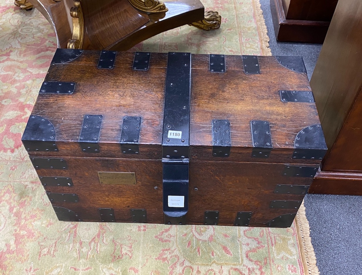 A Victorian iron bound oak silver chest, bears engraved brass plaque, “Major Richards 55 Regt”, width 71cm, depth 35cm, height 38cm